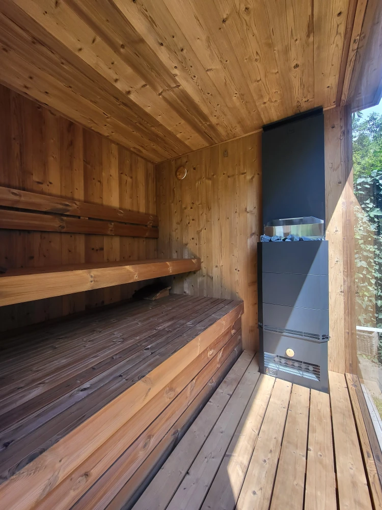 Outdoor house with a sauna and chill-out area