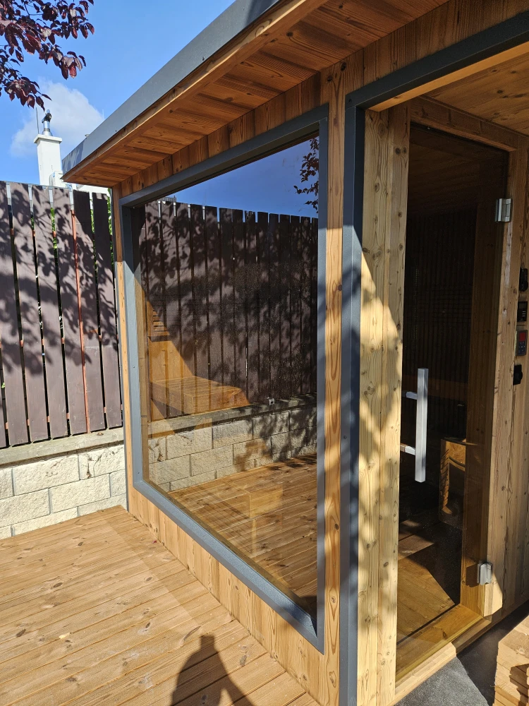 Outdoor sauna with a canopy
