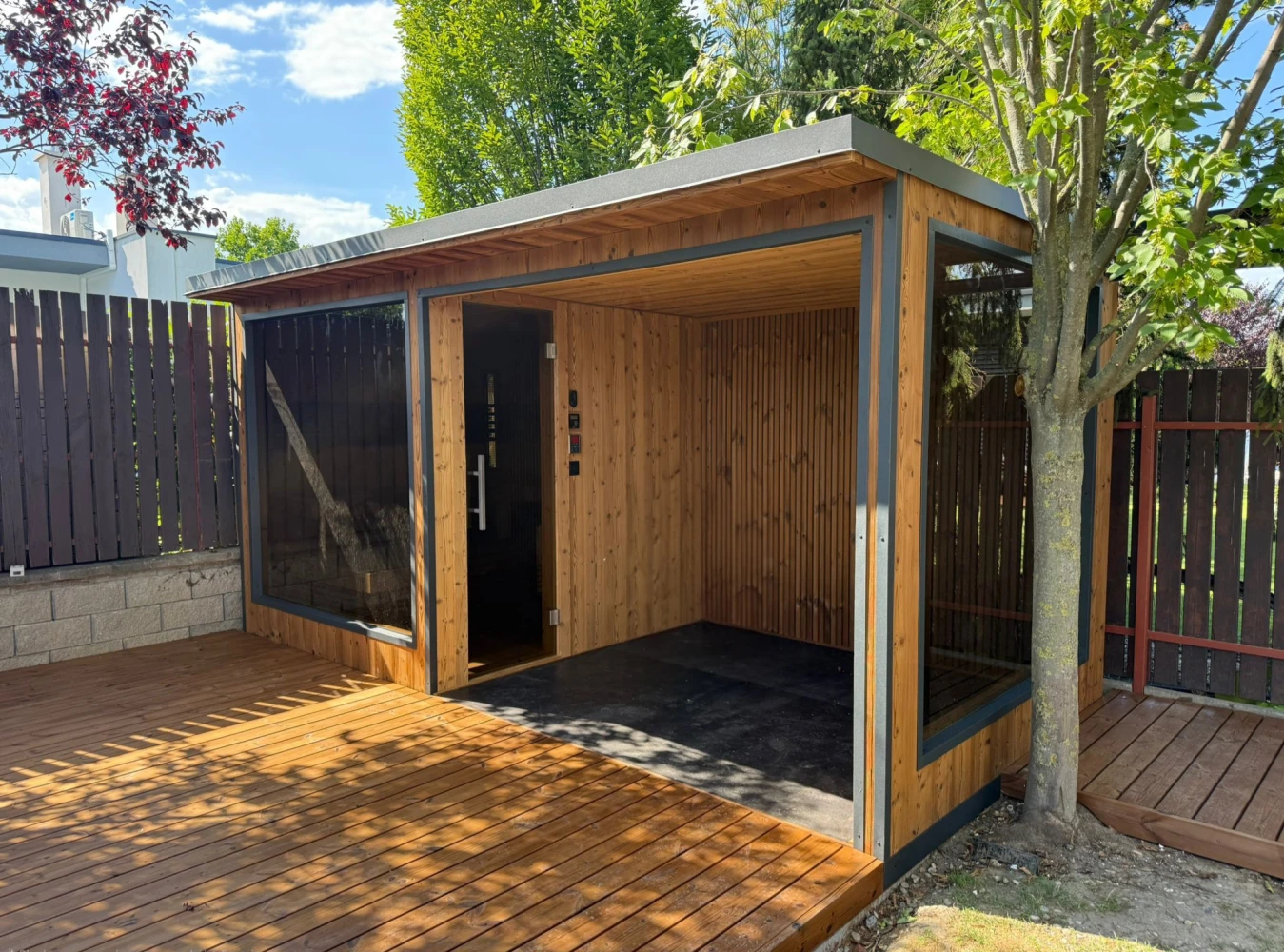 Outdoor sauna with a canopy