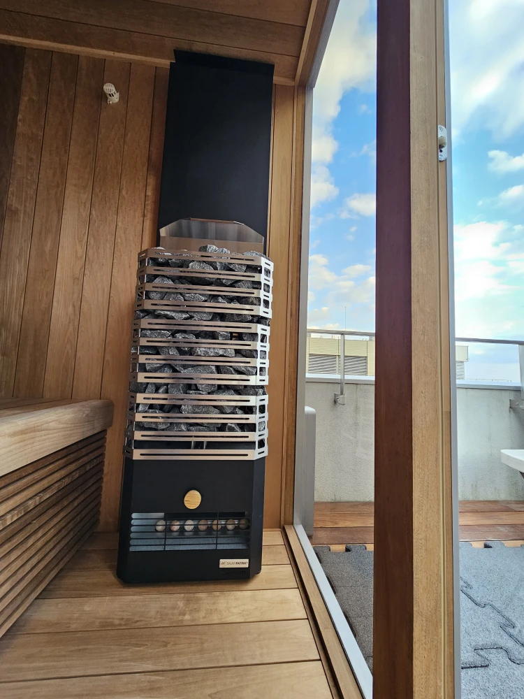 Outdoor sauna on a terrace with sheet metal cladding